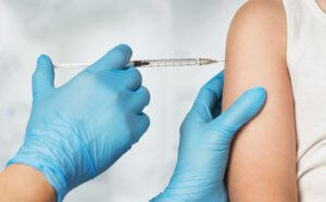 vaccination injection syringe cancer prevention