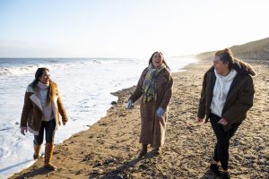 Three women by the beach