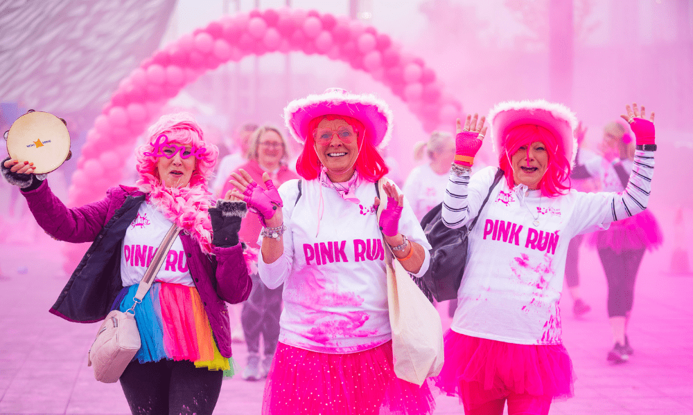 Women walking in pink run